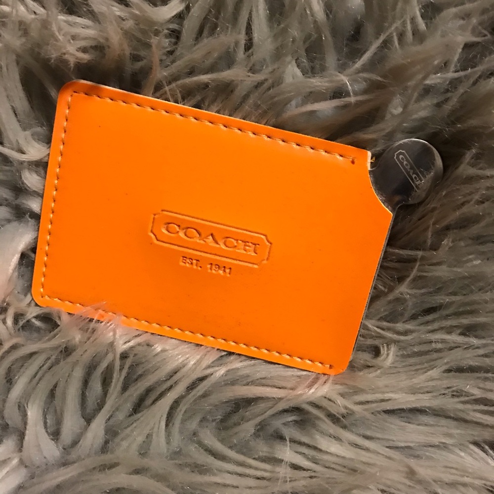 COACH orange pocket mirror